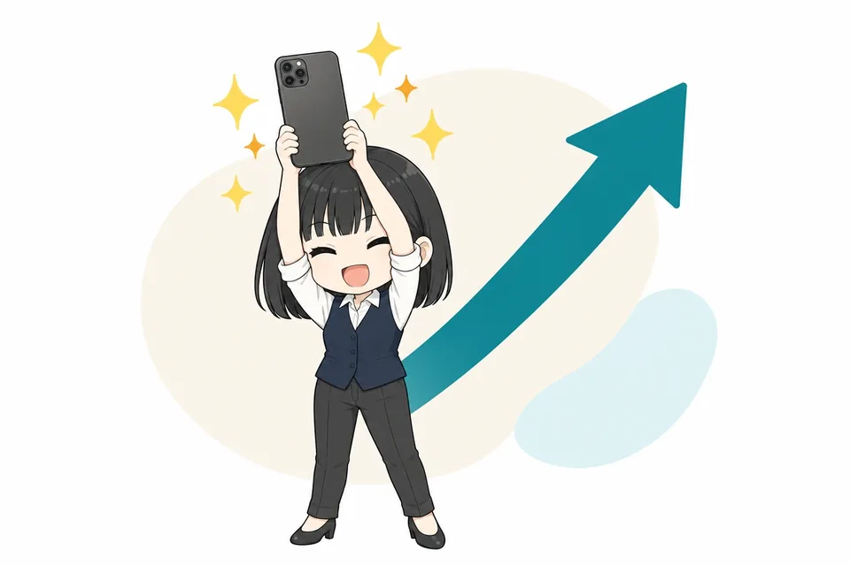 スマートフォンを高く掲げるさや